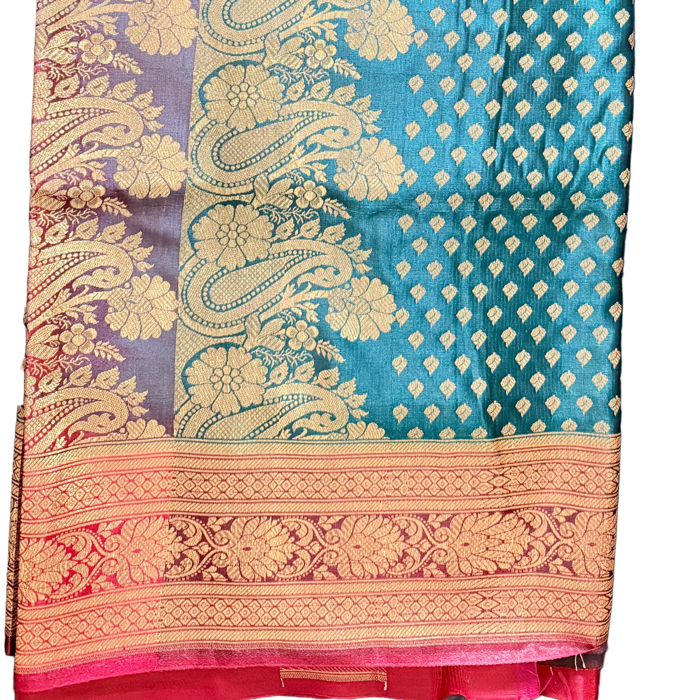 Traditional saree with intricate patterns on a dark green and red background